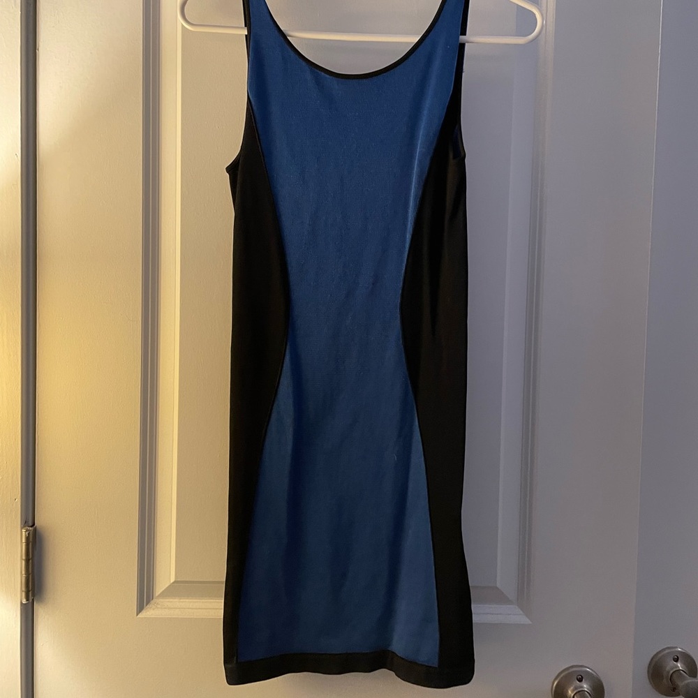 Blue & Black Bodycon Bebe Mini Dress. High scoop neck w/ mid-back opening. M/L